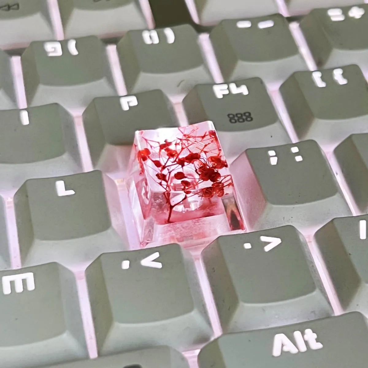 Single resin mechanical keyboard keycap with high transparency and embedded starry sky design, shown in violet colour.