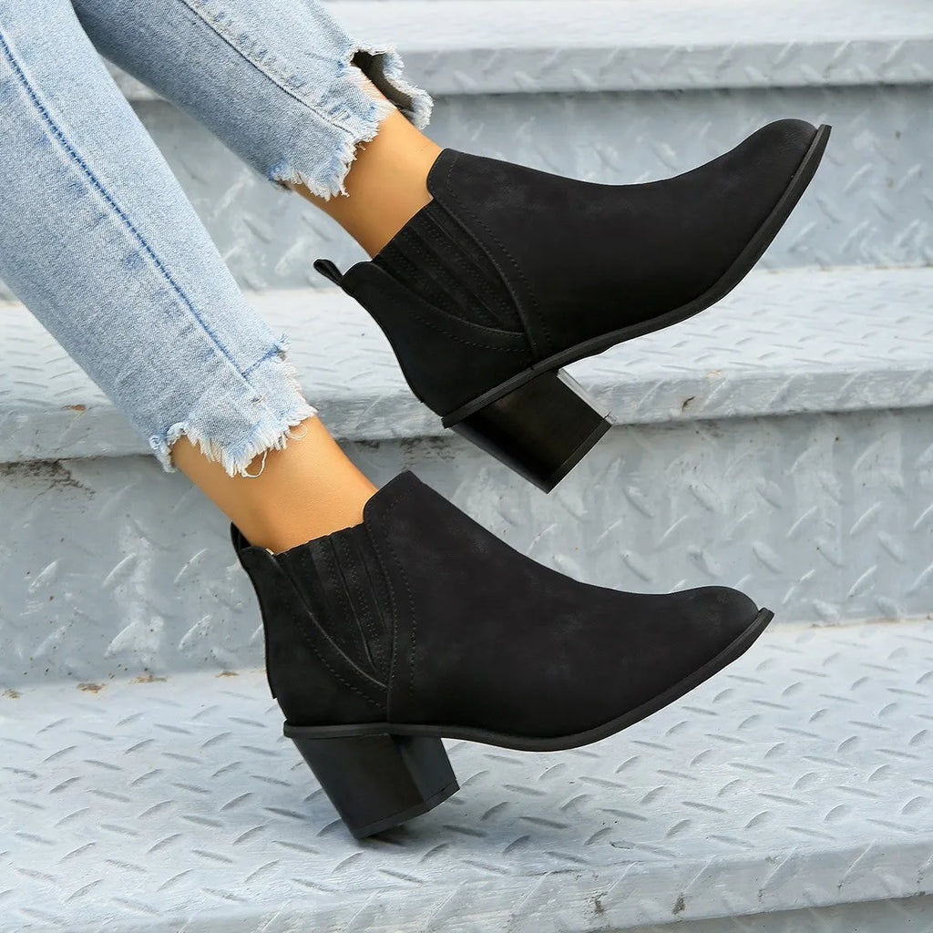Women's black ankle boots with pointed toe and thick square slip-on heel