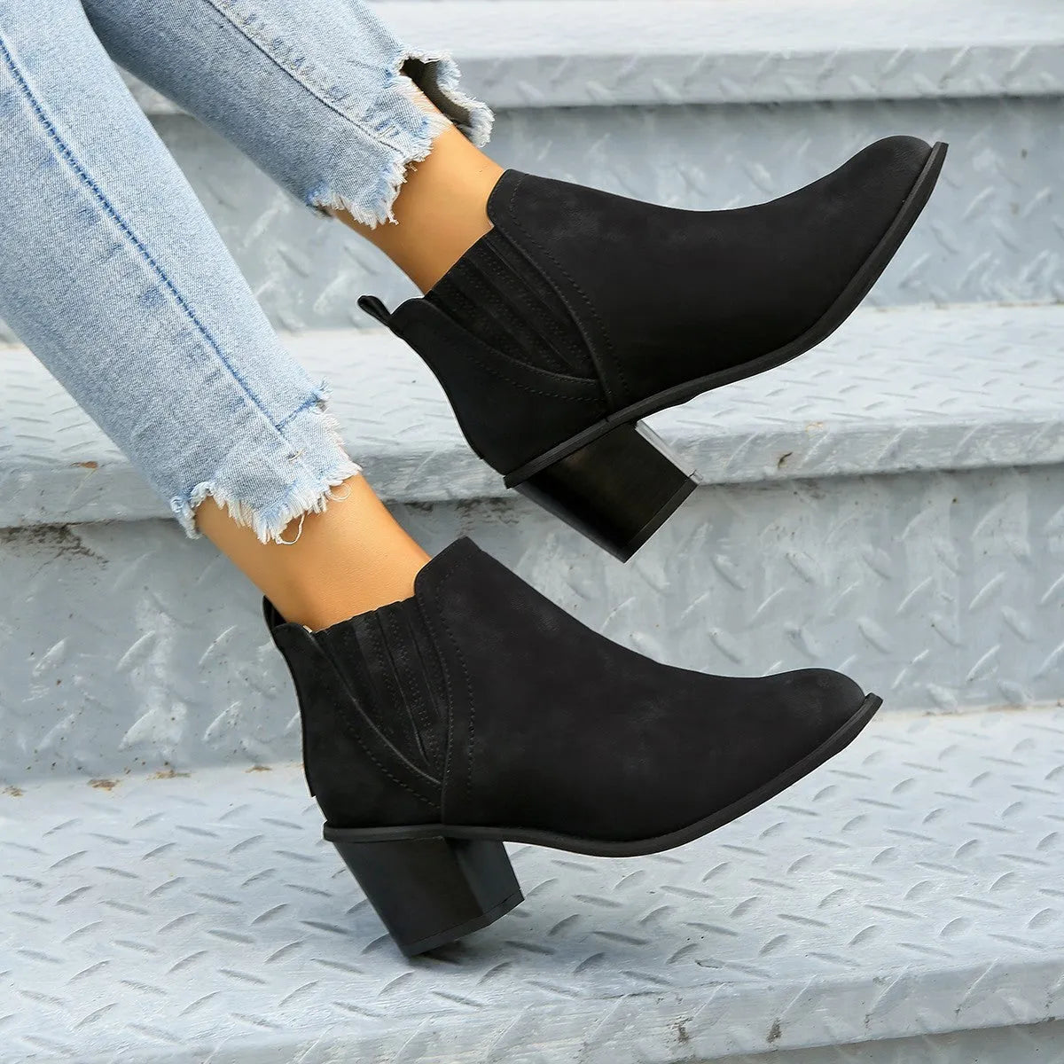 Women's black ankle boots with pointed toe and thick square slip-on heel