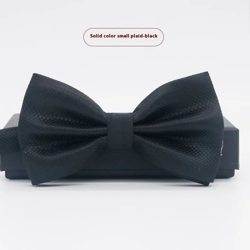 Men's flat head solid colour bow tie in polyester, showing 12cm by 6cm size on a background.