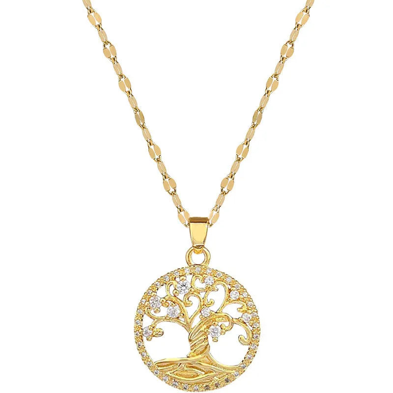 Gold plated Lucky Tree necklace with mother of pearl pendant and rhinestone zircon detail on a lip chain.