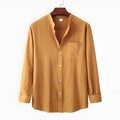 Men's slim fit brown cotton blend long sleeve shirt and pants casual set laid flat.