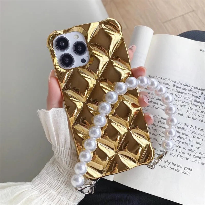 Silver and gold luxury diamond bracelet iPhone cases with chain strap and lock charm for various models.