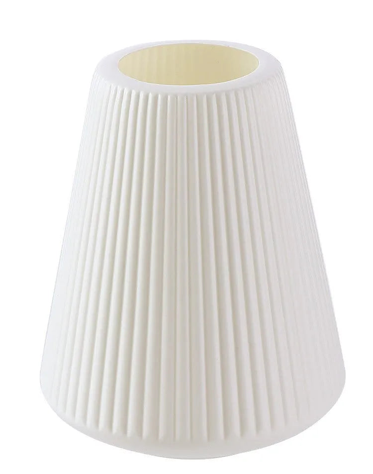 Melamine plastic flower vase in blue colour on desktop with white flowers