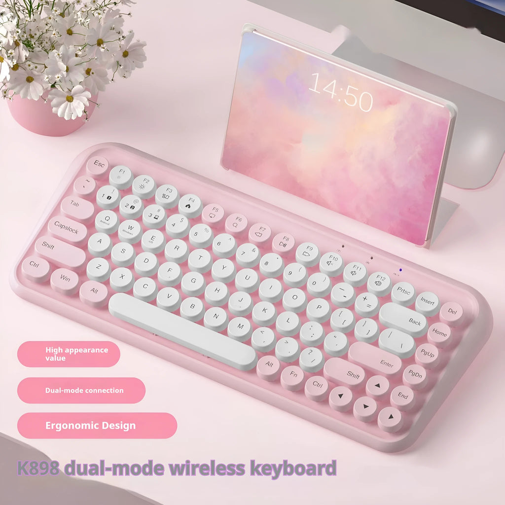 Pink wireless Bluetooth mechanical keyboard with 84 keys and compact portable design
