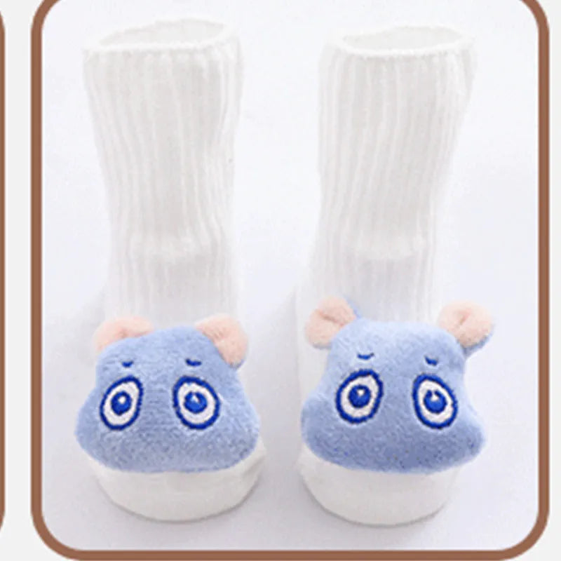 Cotton baby floor socks in various patterns including animal prints, stars, and bows for infants aged 0-3 months