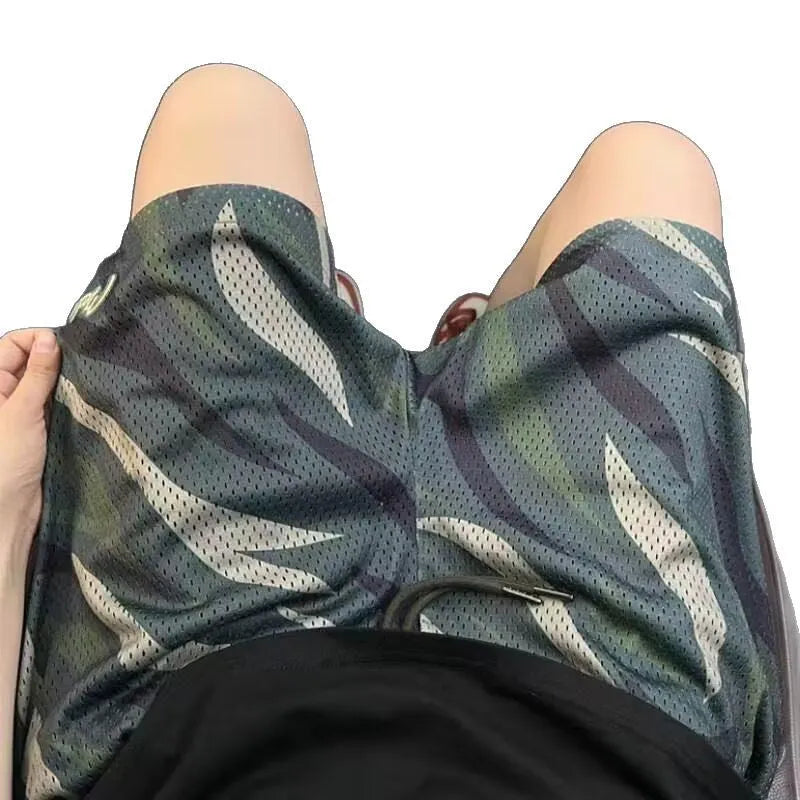 Men's straight leg camouflage mesh shorts in cotton-polyester blend fabric