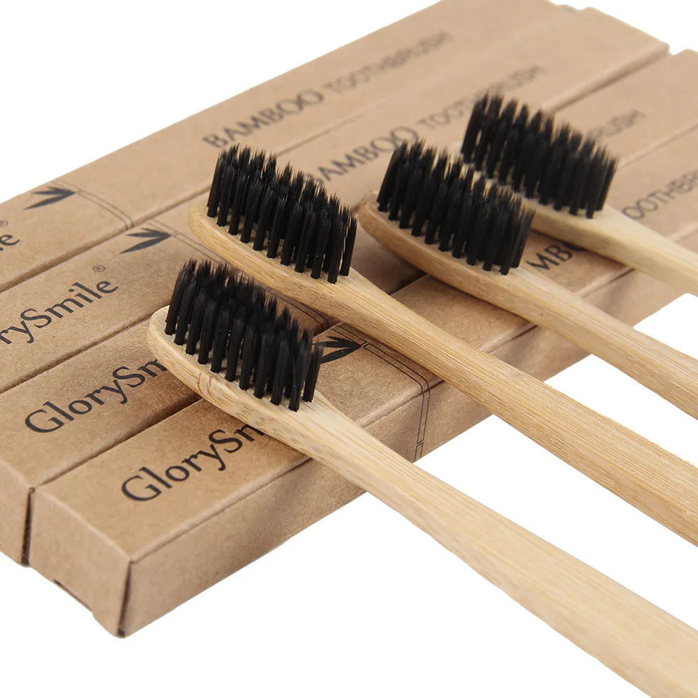 Natural pure bamboo toothbrush with charcoal-infused soft bristles in black, 19.5cm size