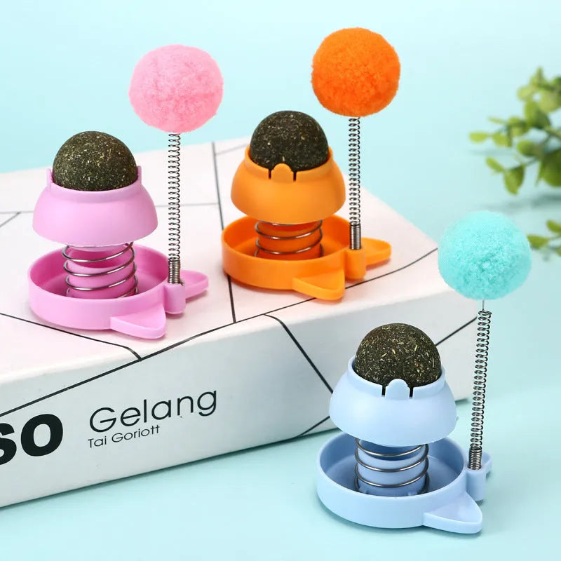 Rotating licking cat toy with mint ball in blue, orange or pink colours