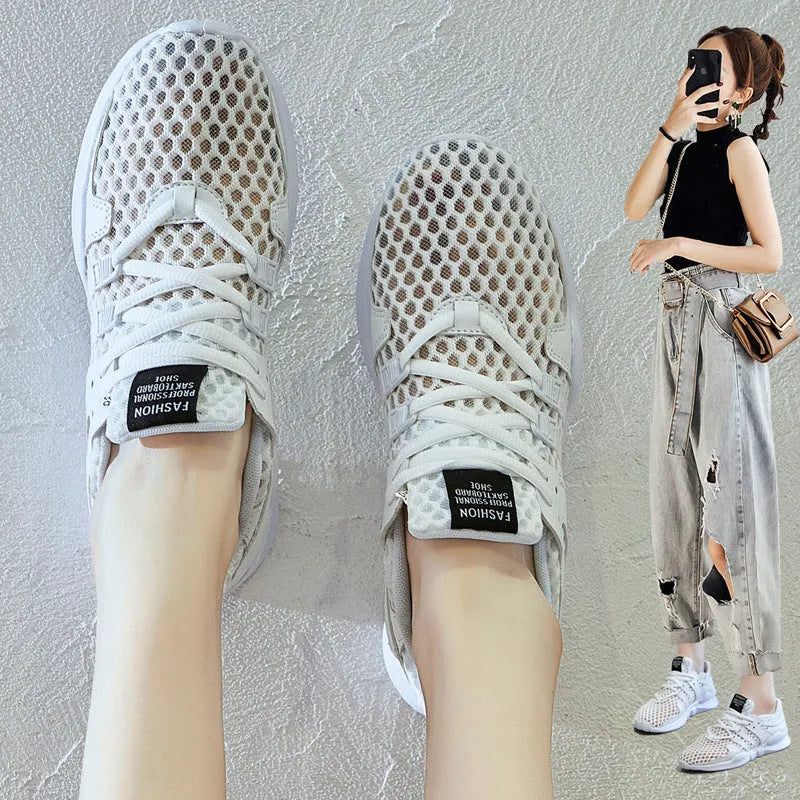 Side view of black hollow breathable mesh sneakers with flat EVA sole and round toe design