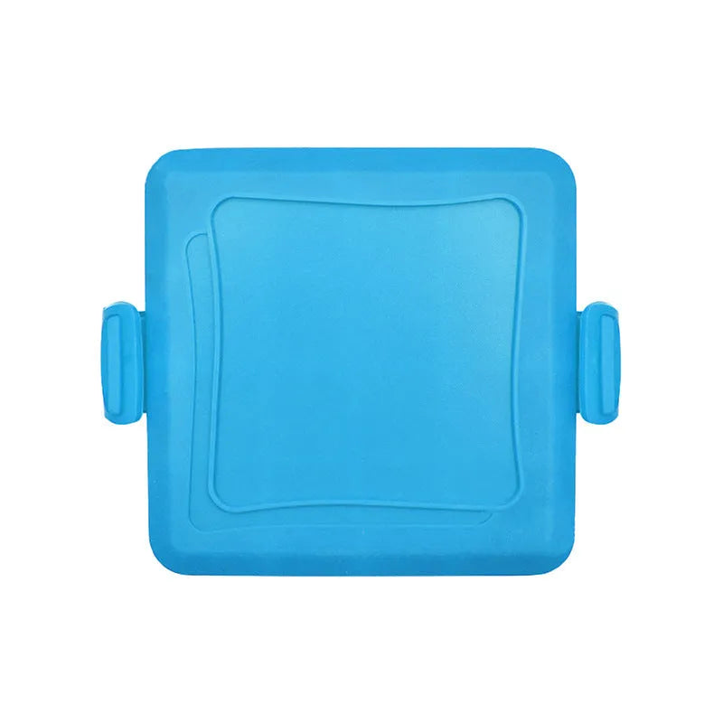 Red silicone baking tray with heat-resistant gloves on kitchen counter