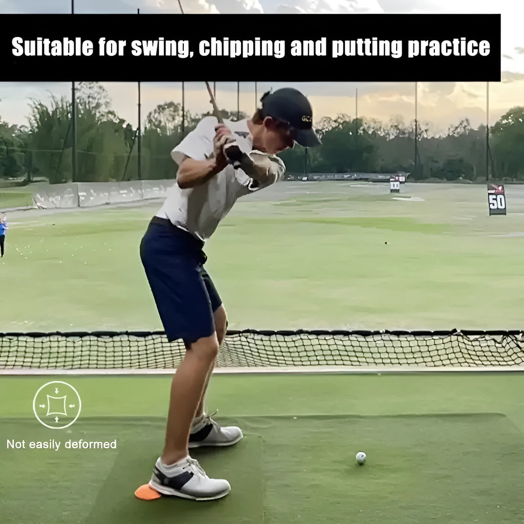 Orange-red golf training mat with weighted centre for swing practice