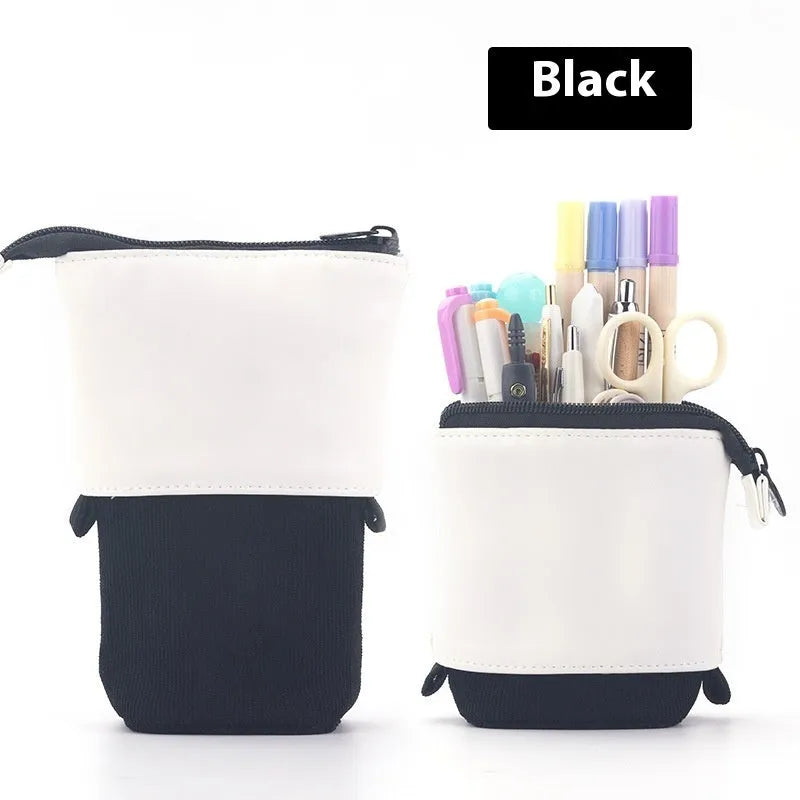 Corduroy drop-down telescopic stationery case in six colour options on a desk