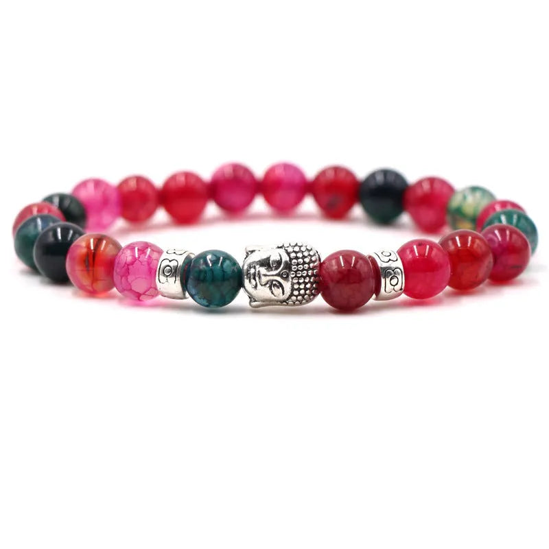 Natural stone stretch bracelet with tigereye, volcanic rock and turquoise beads on wrist