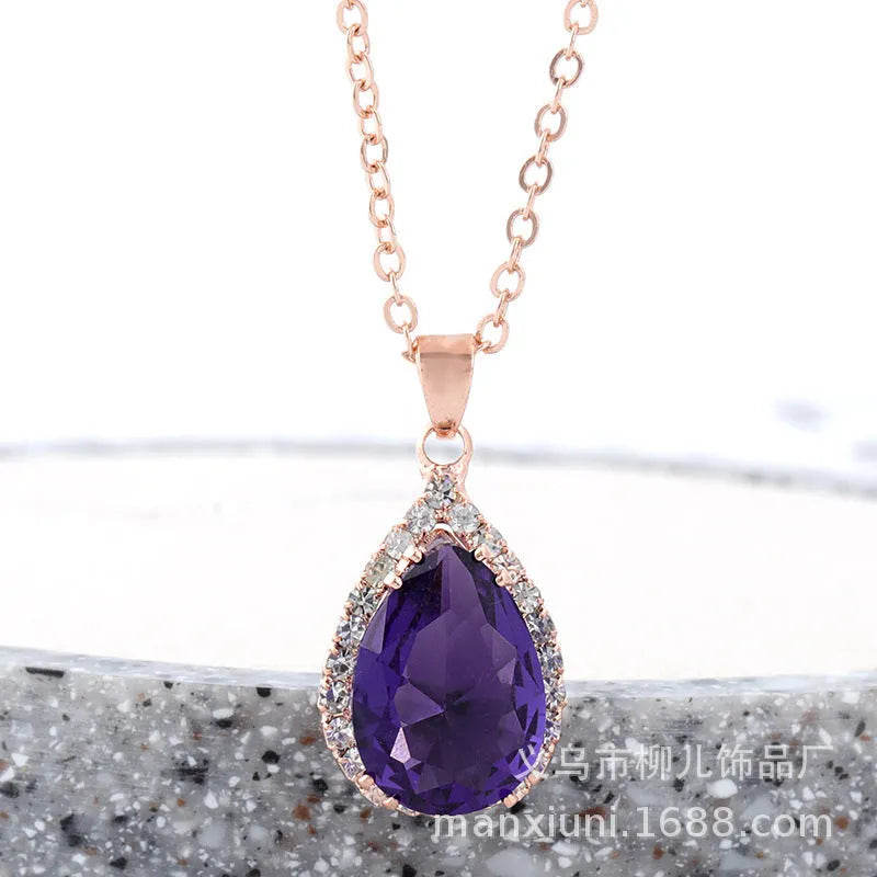 Drop shape geometric pendant necklace with rhinestone inlay in pink rose gold electroplated finish