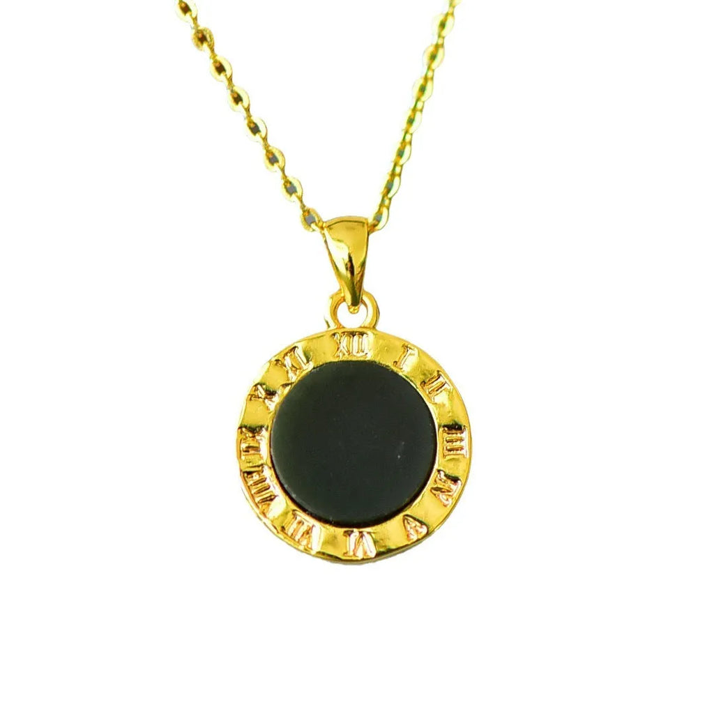 Flat grey Hetian jade pendant with copper wire inlay decoration and ink blue jade accents on a necklace.