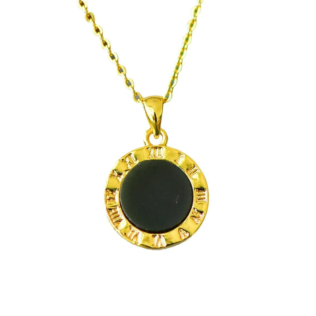 Flat grey Hetian jade pendant with copper wire inlay decoration and ink blue jade accents on a necklace.