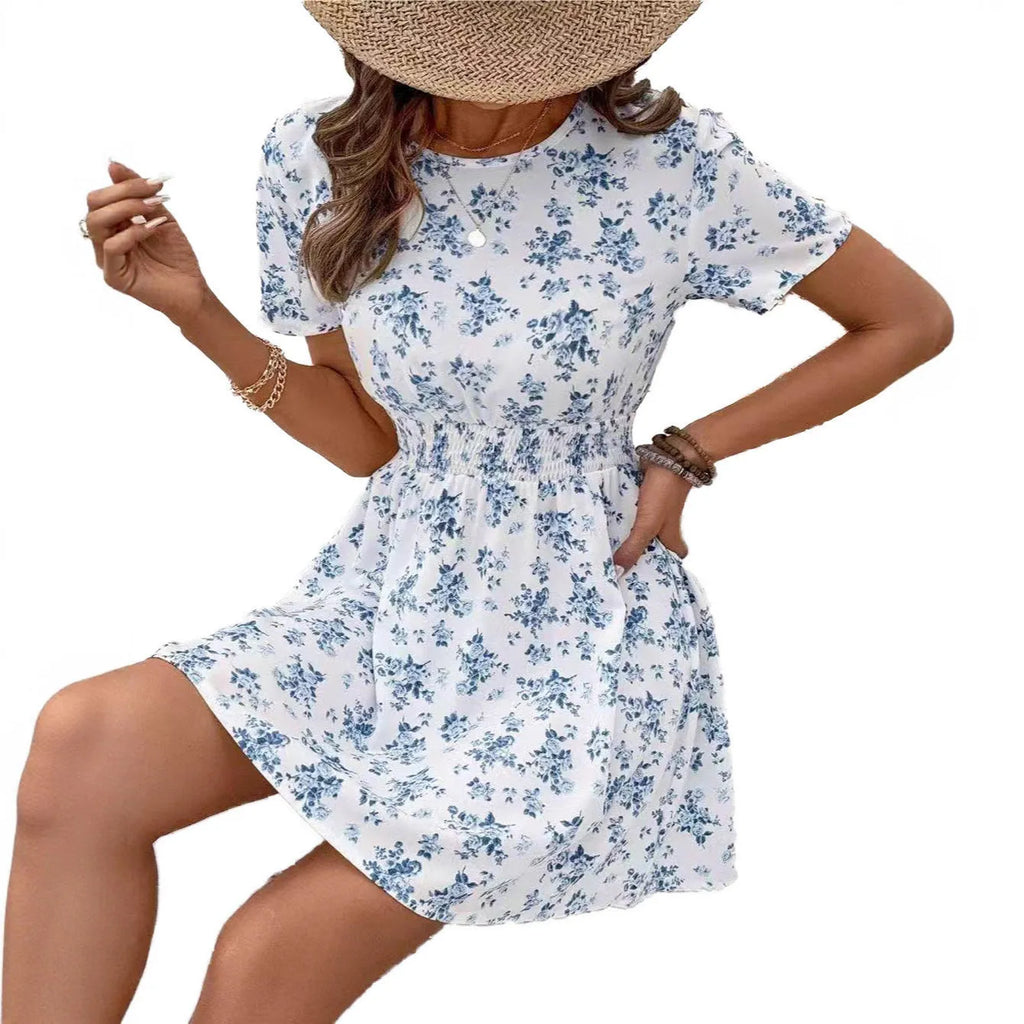 Light blue A-line midi dress with high waist and regular sleeves on mannequin