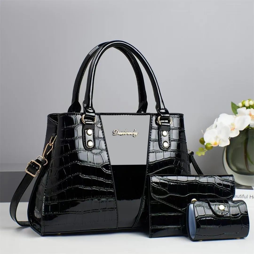 Women's crocodile-stitch three-piece shoulder bag set in PU leather showing main bag with sandwich pocket and two smaller pouches.