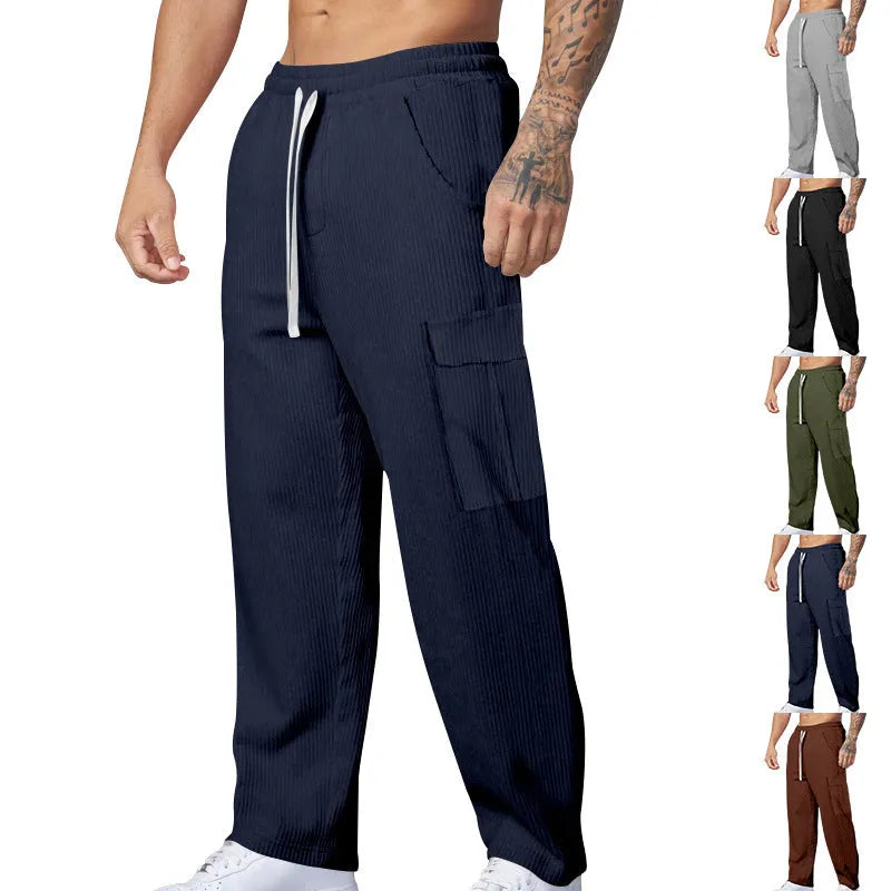 Men's corduroy cargo trousers in straight-leg wide-cut design with drawstring waist closure