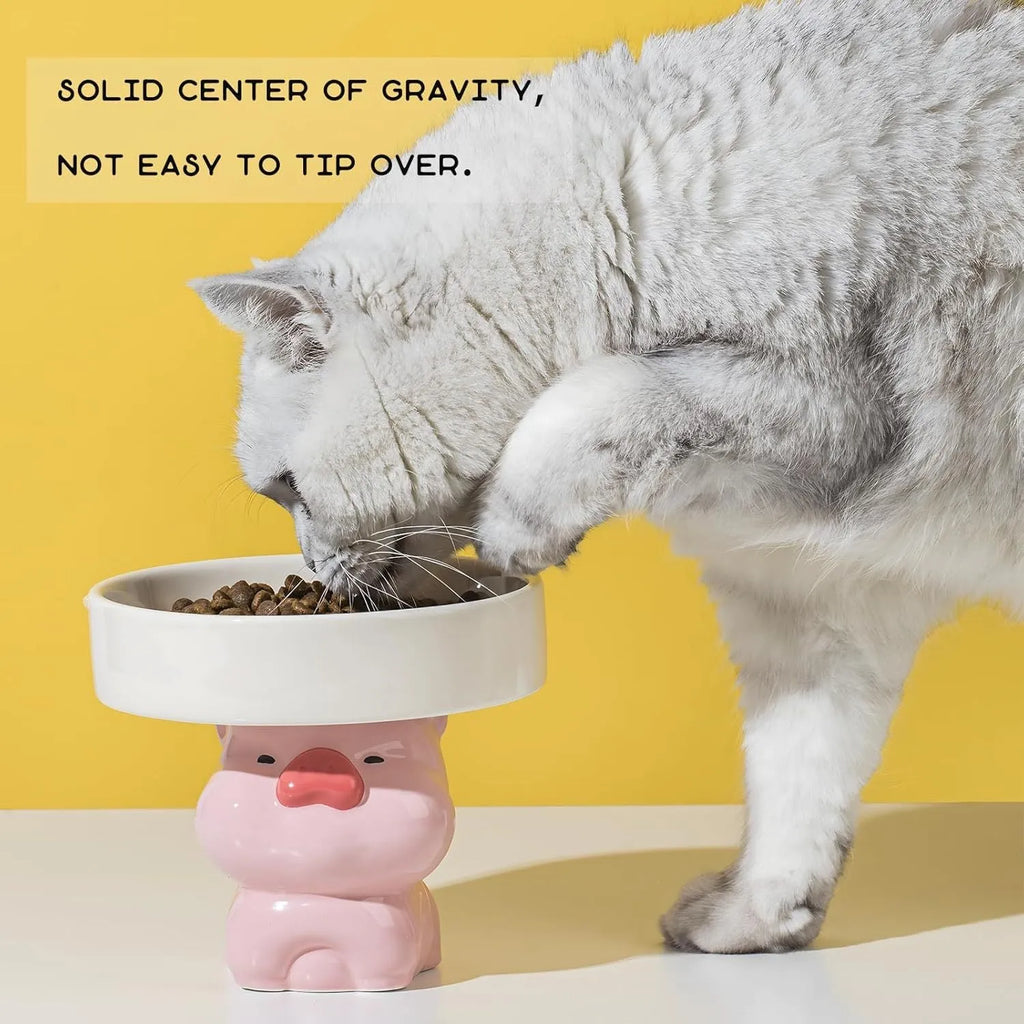 Ceramic raised pet bowl in animal design, showing wide 15cm opening and 4.92-inch elevation.