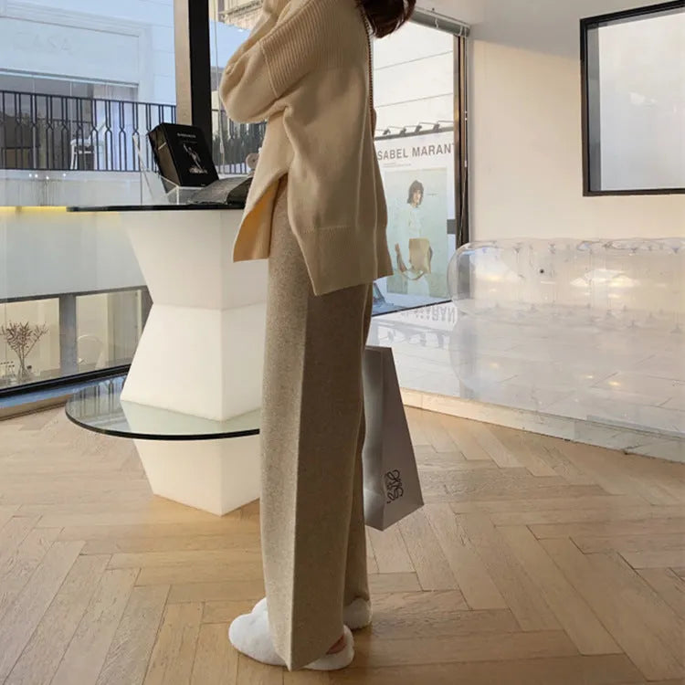 Women's high waist knitted wide-leg trousers in black colour showing straight-leg drooping style