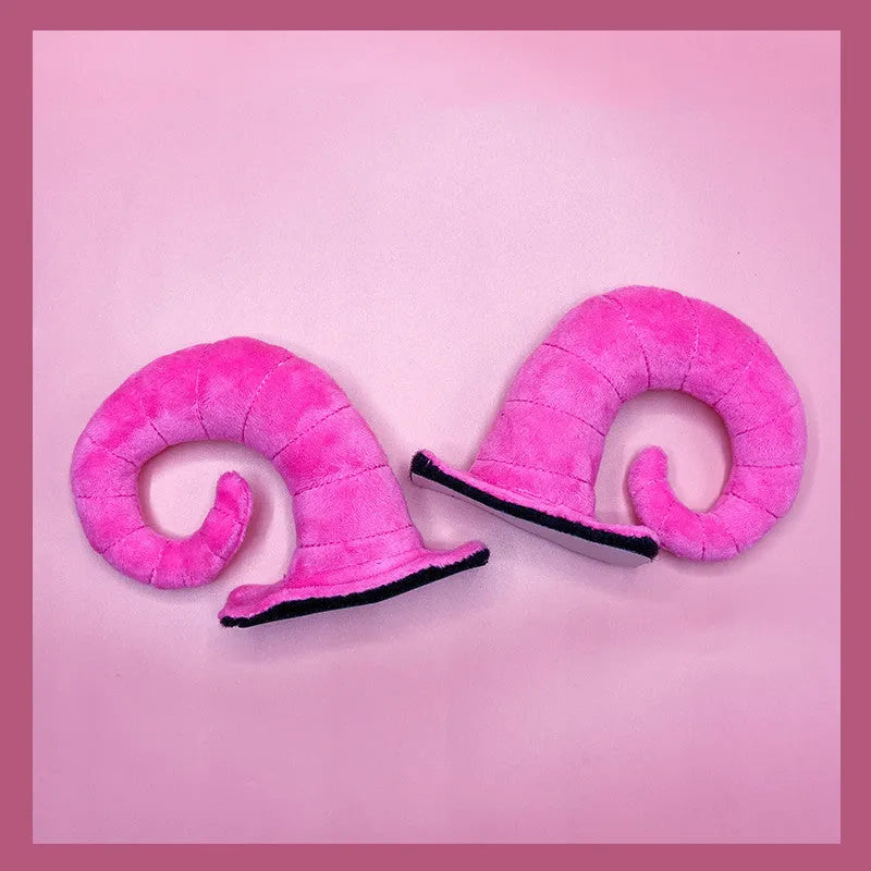 A pair of composite fibre demon horn decorations for a motorcycle helmet in black, pink, brown, or grey.