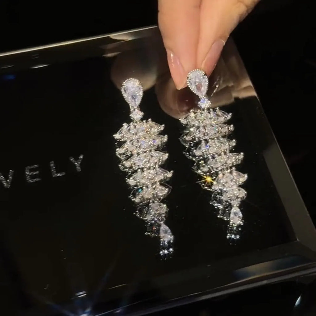 Silver pagoda Christmas tree drop earrings with sparkling zircon stones and stud fastening