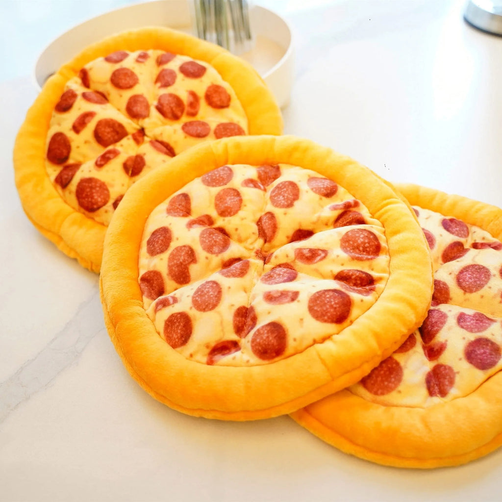 Yellow pizza slice dog chewing toy with squeaker made from teddy fabric