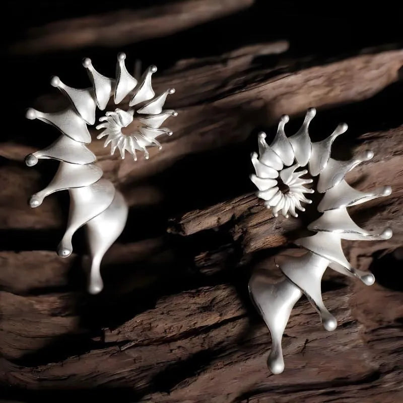 Exaggerated conch-shaped three-dimensional matte alloy stud earrings with electroplated finish