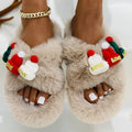 Adult Christmas hat decoration slippers in faux plush with rubber sole.