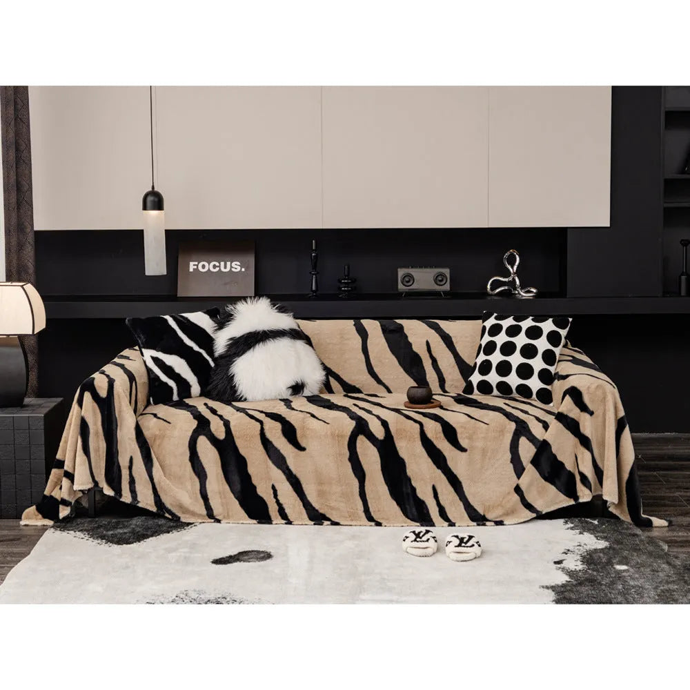 Zebra pattern flannel sofa cover with non-slip design on furniture