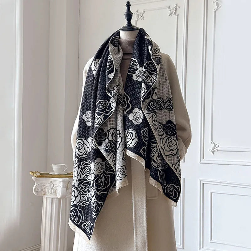 Grey imitation cashmere winter scarf with tassels laid flat, showing its long rectangular shape.