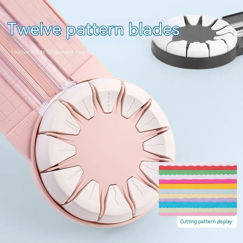 Pink 12-in-1 dotted line paper cutting machine on desktop for card making and scrapbooking