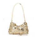 A soft polyester women's underarm crossbody bag in a metallic colour, showing sewing thread detail and a single strap.