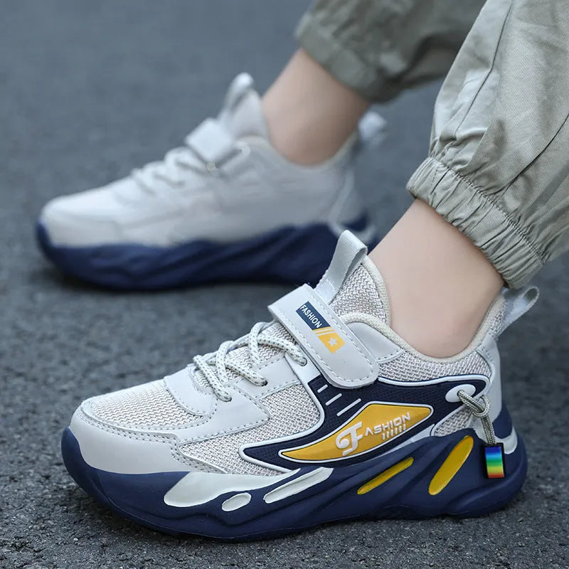 Boys' platform sports running shoes in dark blue with Velcro strap and mesh upper.