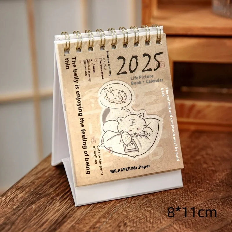 Mini A5 desk calendar 2025 showing one of eight themed designs in simple modern style