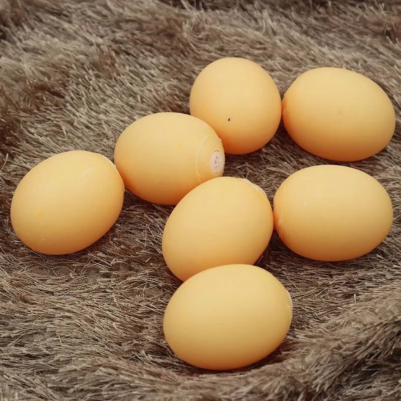 Egg-shaped dog squeaky toy for dental cleaning with sound mechanism
