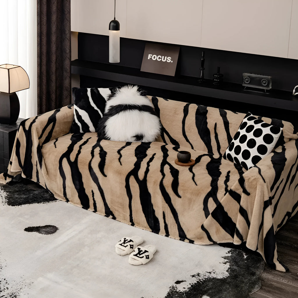 Zebra pattern flannel sofa cover with non-slip design on furniture
