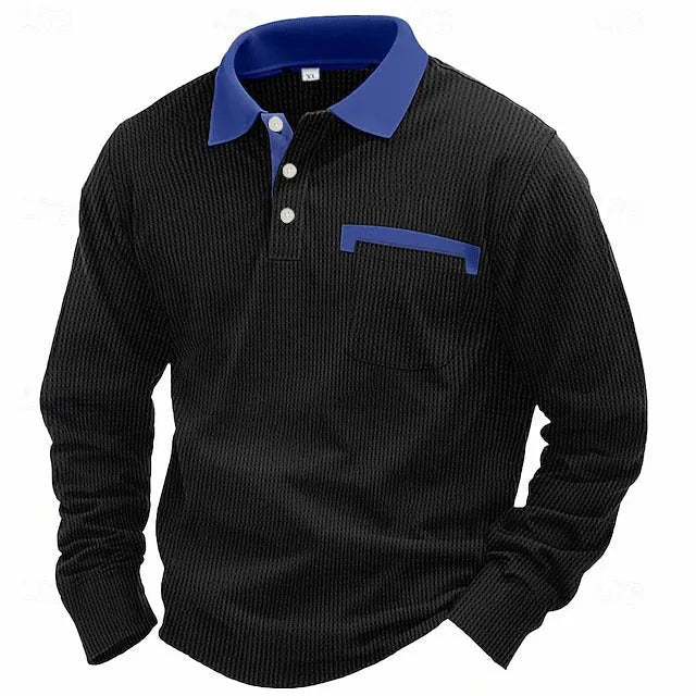 Man modelling a loose-fit long-sleeved waffle-knit polo shirt in a solid colour with an asymmetrical style detail.