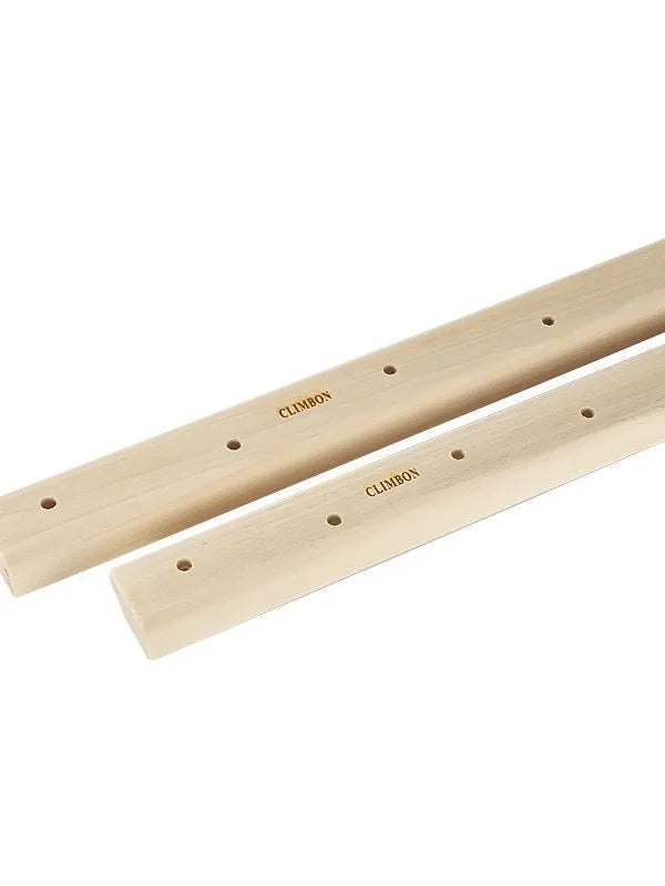 Three wooden hangboards for grip strength training in different lengths mounted for exercise