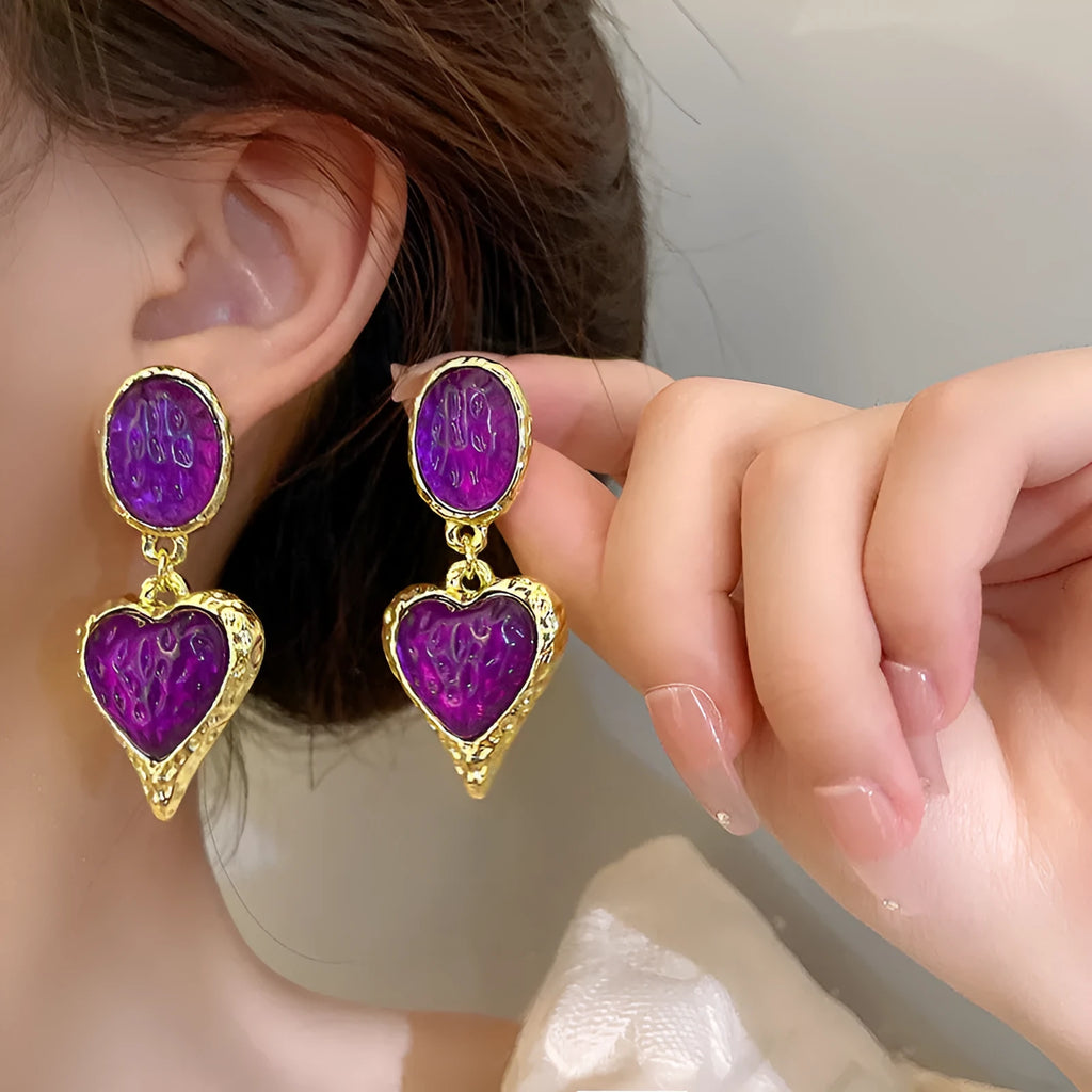 Silver needle pleated oval love heart stud earrings in alloy, showing green, purple, red, and yellow and white colour options.