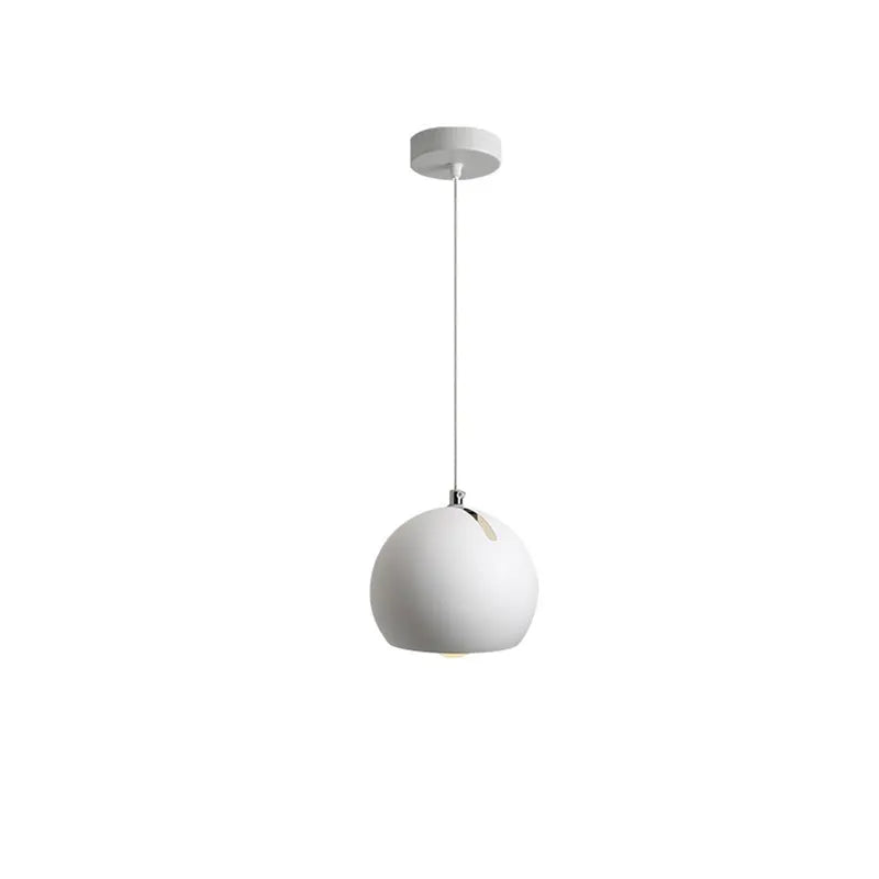 Modern Nordic-style ball chandelier table lamp in Moon White finish on a wooden surface.