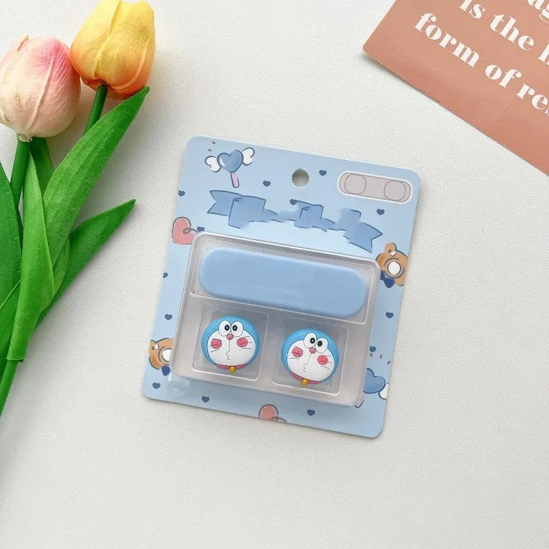 Colourful cartoon-style plastic fixer for organising a magnetic data cable on a desktop
