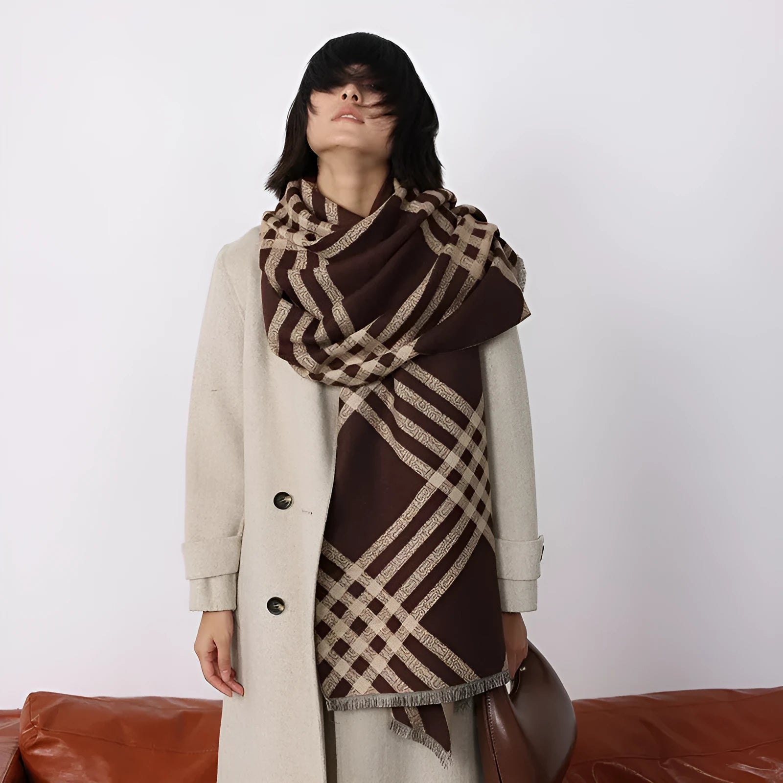 Long brown imitation cashmere scarf with tassels laid flat, showing its 185cm length.