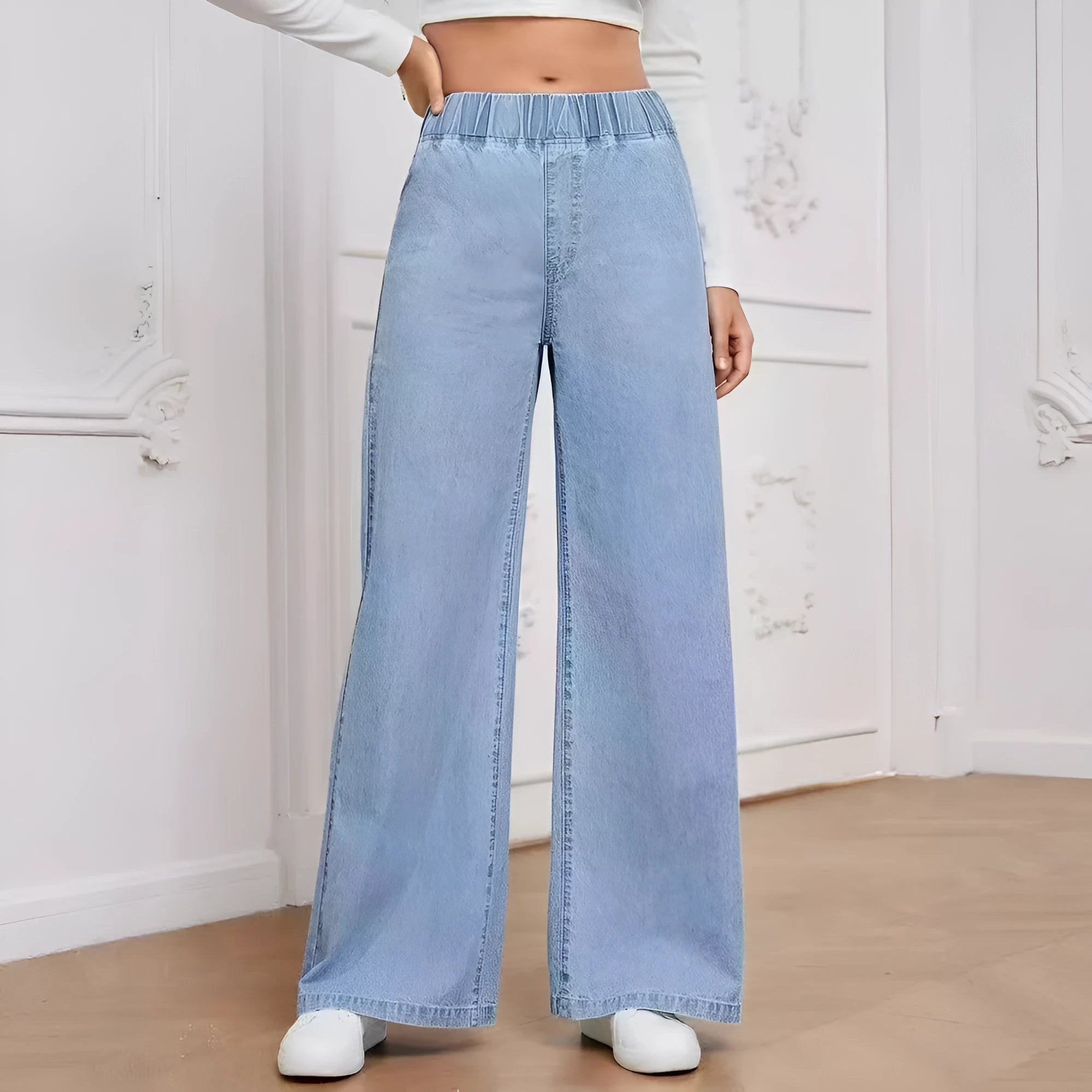 Women's light blue wide-leg denim jeans with straight cut and mid waist