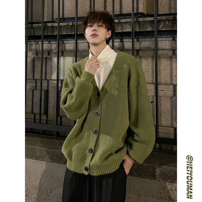 Men's loose fit V-neck cardigan sweater in army green, made from a cotton blend fabric.