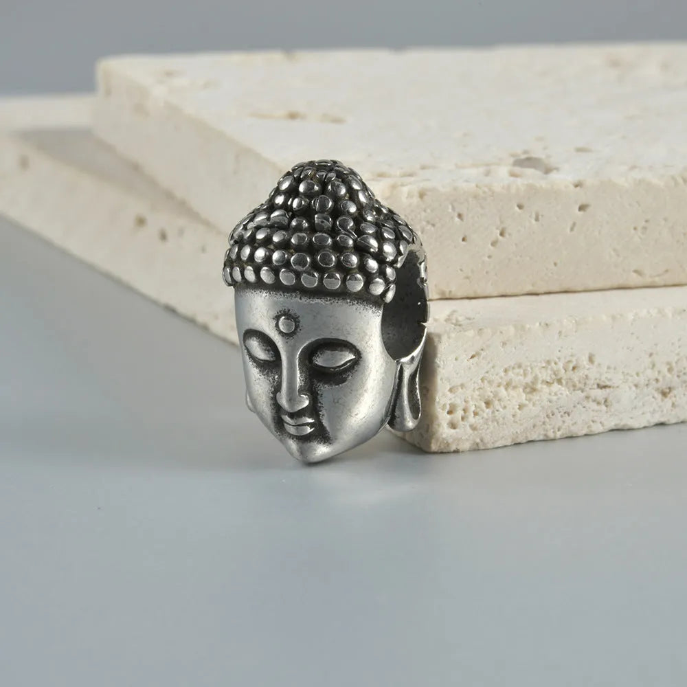 Stainless steel hollow skull Buddha earrings with geometric hip hop design in electroplated finishes