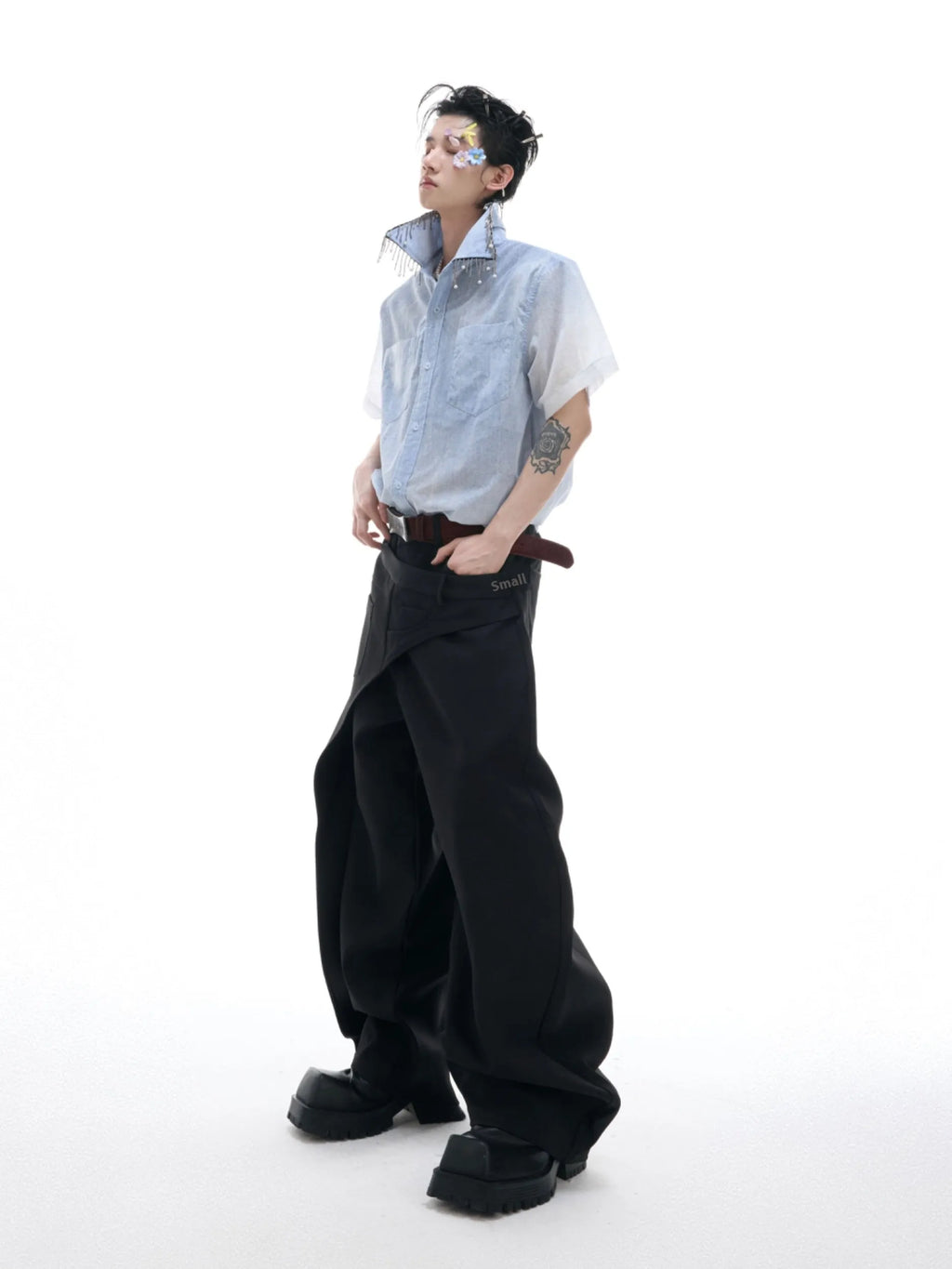 Men's solid blue loose fit short sleeve casual shirt on a hanger.