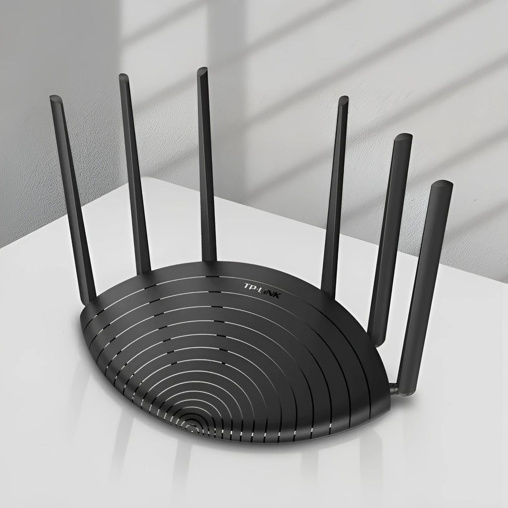 TL-WDR7661 black wireless router with multiple antennas on a desk